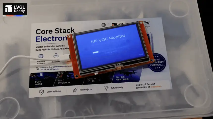 A student using an LVGL touch interface on the CYD board
